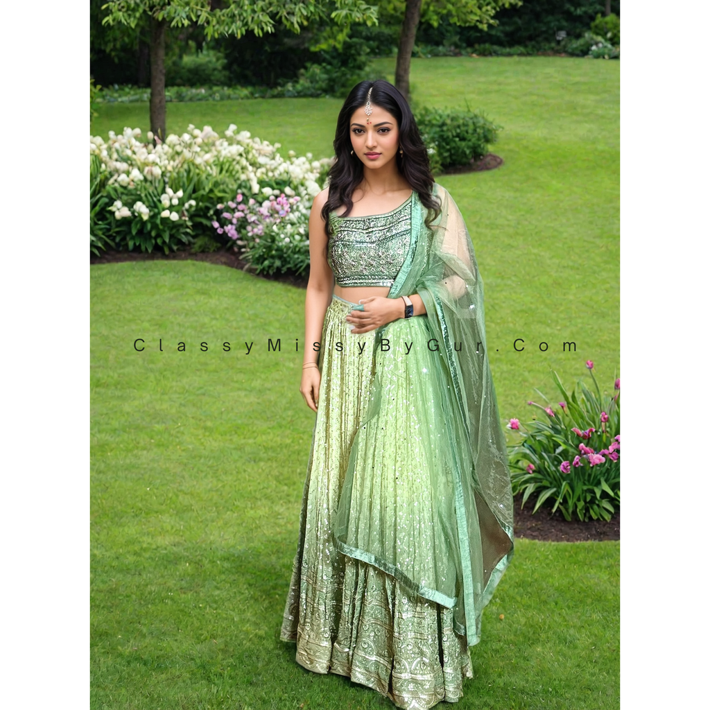 Exquisite Green Lehenga Choli with Intricate Embroidery and One-Side Strap Neck