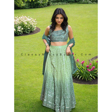 Load image into Gallery viewer, Exquisite Green Lehenga Choli with Intricate Embroidery and One-Side Strap Neck